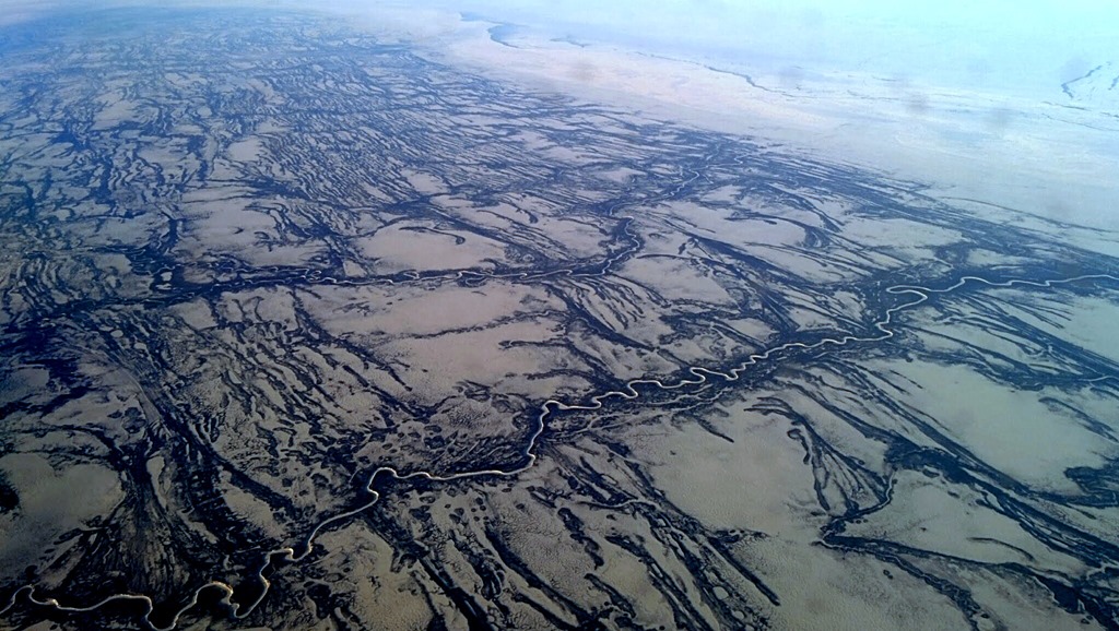 Hudson bay giving way to the endless North Canadian tundra
