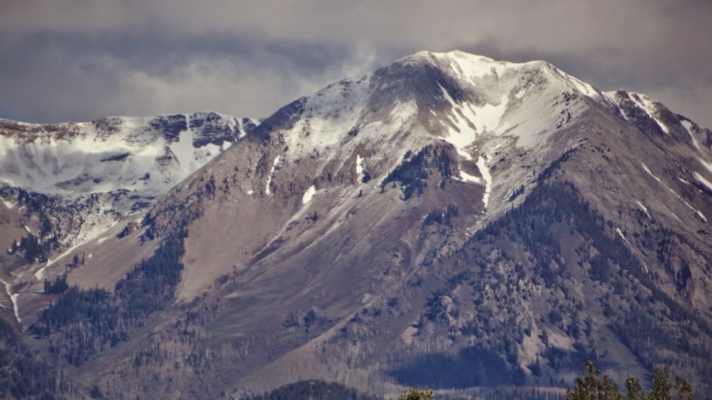 The fresh May snow coating the peaks