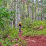 Dustin riding on the red dirt at the top of pipeline, just before we met up with Hardscrabble road