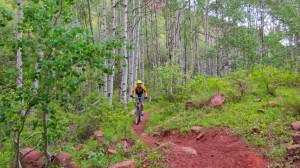 Dustin riding on the red dirt at the top of pipeline, just before we met up with Hardscrabble road
