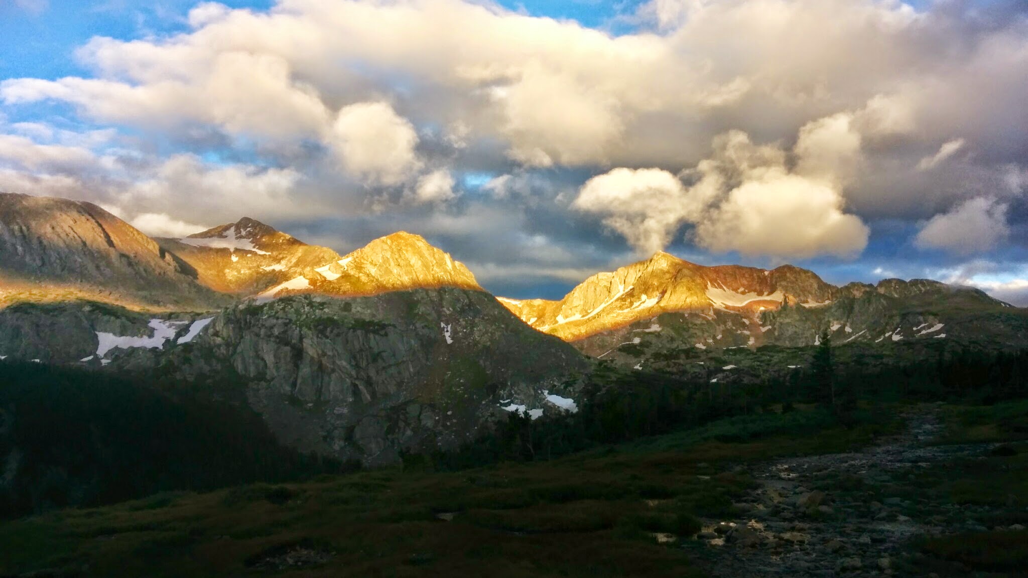 The sun breaking over Mt Jasper in the Indian Peaks